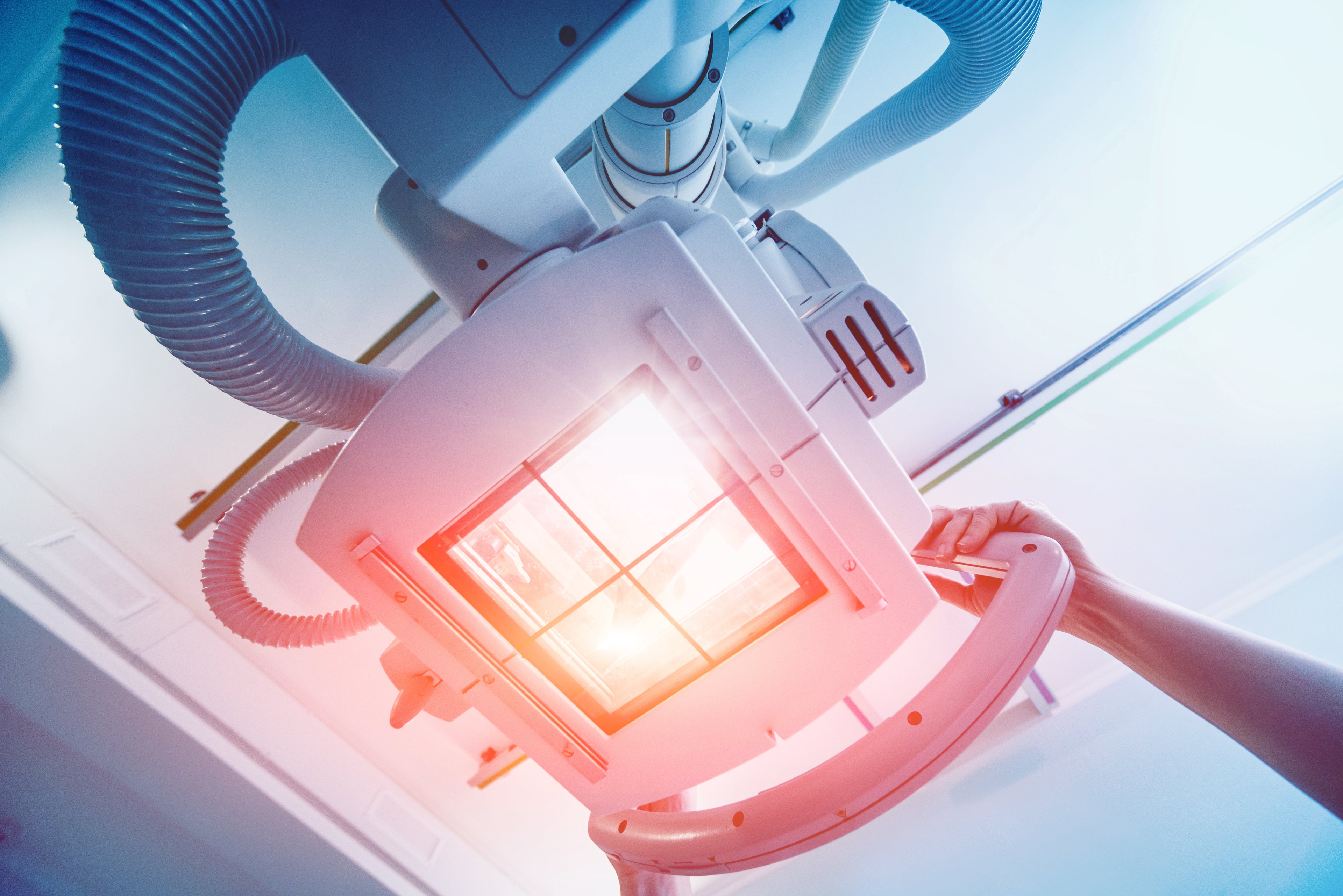 View of X-Ray machine from below, red and blue colors.